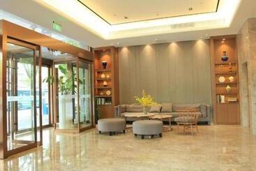 هتل Home Inn Plus Shanghai Middle Ring Jinshajiang Road Fengzhuang Metro Station
