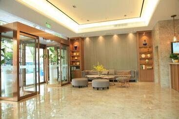 هتل Home Inn Plus Shanghai Middle Ring Jinshajiang Road Fengzhuang Metro Station