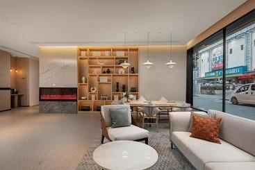 هتل Country Inn & Suite By Radisson, Guangzhou Railway Station Xiaobei