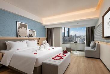 هتل Country Inn & Suite By Radisson, Guangzhou Railway Station Xiaobei