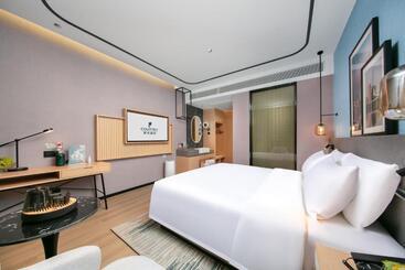 هتل Country Inn & Suite By Radisson, Nanchong Gaoping Airport North Sichuan Medical College