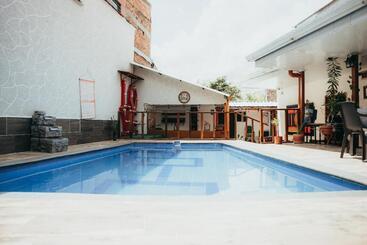 پانسیون Casa Hotel Hostal Del Cafe