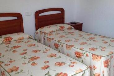ペンション Habitaciones López Azcona