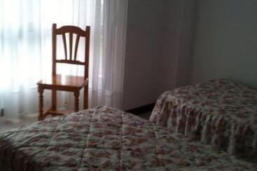 ペンション Habitaciones López Azcona