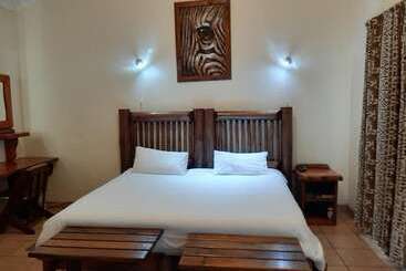 تختخواب و صبحانه Zebra Guesthouse