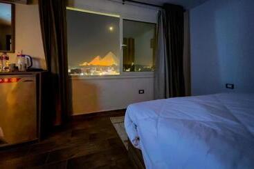 تختخواب و صبحانه Imperial Pyramids Heights View