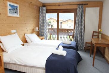 هتل Hôtel Les Dents Blanches