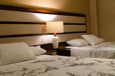 Infinity Suites Habitación Triple