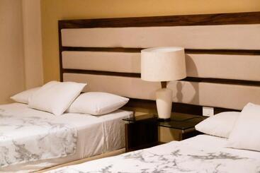 Infinity Suites Habitación Triple
