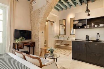 پانسیون Art Suites By Casa Del Santo