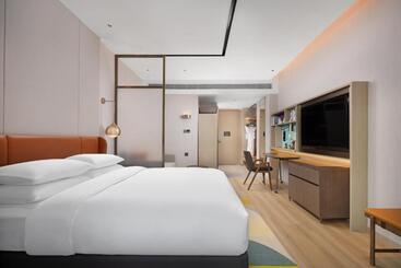 هتل Home2 Suite By Hilton Wuhan Economic Development Zone