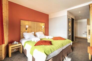 هتل Hôtel Les Menuires Les Bruyères