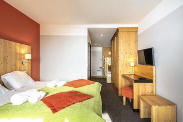 هتل Hôtel Les Menuires Les Bruyères