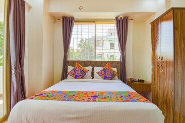Fabhotel Red Velvet Inn & Suites