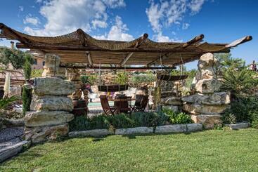 Il Giardino Dei Flintstones B&b