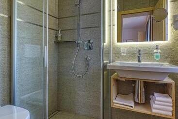 تختخواب و صبحانه Garni Appartments Helvetia