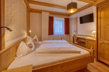 تختخواب و صبحانه Garni Appartments Helvetia