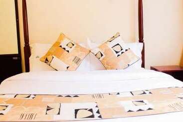 تختخواب و صبحانه Alpha Country Motel