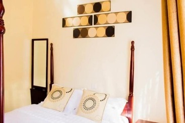 تختخواب و صبحانه Alpha Country Motel