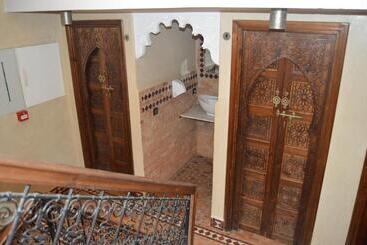 تختخواب و صبحانه Riad Golf Stinia