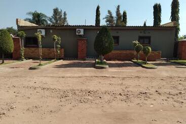 هتل Sunset Junction Lodges & Tours