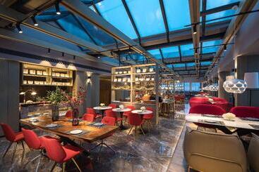 هتل Ramada Encore By Wyndham Yangzhoudong Railway Station