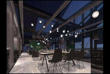 هتل Ramada Encore By Wyndham Yangzhoudong Railway Station