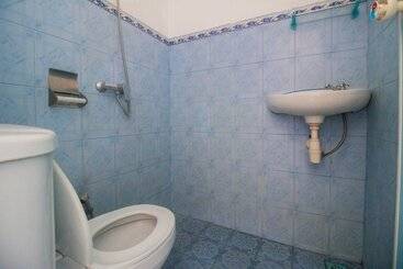 هتل Reddoorz Near Pantai Boom