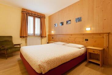 هتل Chalet Stelle Di Neve