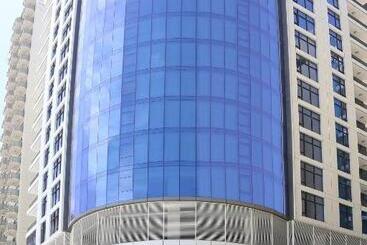 هتل Belle Tower Apartments
