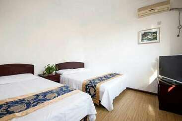 هتل Liuzhuang Huayuhai Holiday Hostel