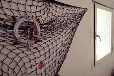 هتل Hostal Casa Nautilus