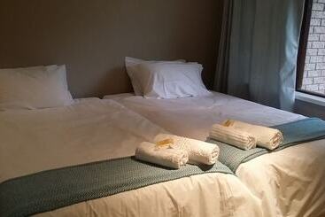 Отель Cokama Guesthouse