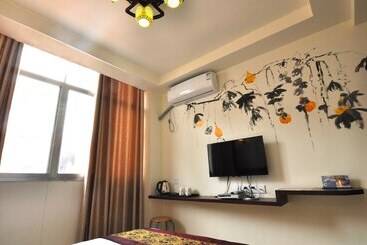 هتل Zhanguajiajie Huluju Inn