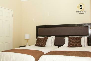 تختخواب و صبحانه Streets Of Gold Guest House
