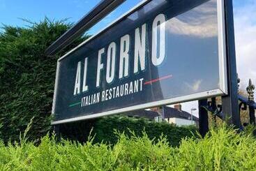 هاستل Al Forno Restaurant & Inn