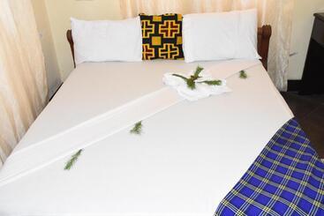 تختخواب و صبحانه Travellers Home
