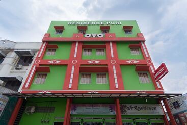 Capital O 615 Residence Puri Hotel Syariah