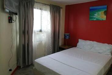 تختخواب و صبحانه Cozy Inn Mactan