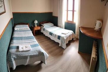 旅馆 Hostal Rio Ona