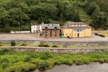 پانسیون Apartamentos Turisticos A Estacion