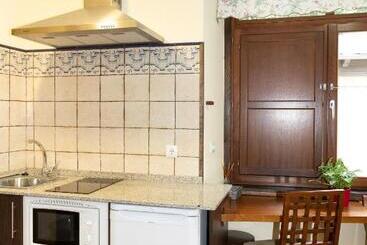 پانسیون Apartamentos Turisticos A Estacion