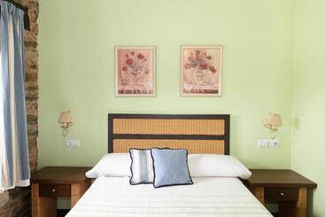 پانسیون Apartamentos Turisticos A Estacion