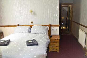 تختخواب و صبحانه Pine Lodge
