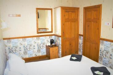 تختخواب و صبحانه Pine Lodge