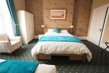 تختخواب و صبحانه Cowrie Guest House