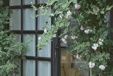 پانسیون Encounter Garden Great Wall Holiday Guesthouse