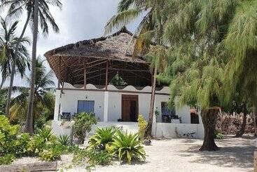 تختخواب و صبحانه Blue Palm Zanzibar