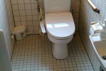 پانسیون Guesthouse Amami Long Beach
