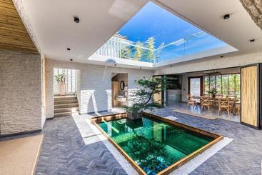 تختخواب و صبحانه Dali Mu Yun Inn